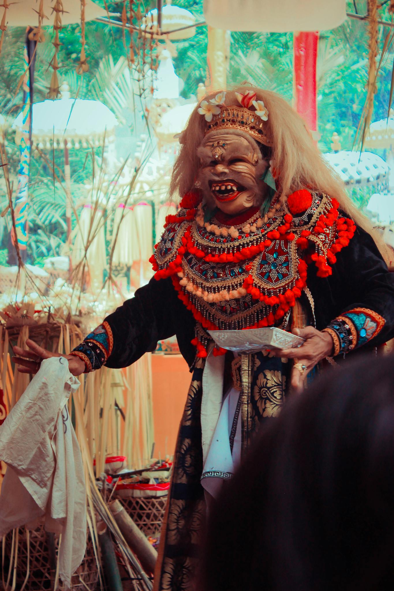 Vibrant Balinese traditional mask dancer performing in Amlapura, Bali, Indonesia.